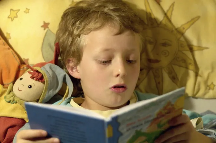 Framed Print : Boy Reading in Bed Print Framed Print : Boy Reading in Bed Print
