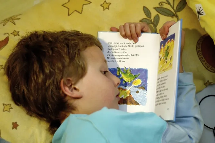 Framed Print : Boy Reading in Bed Print Framed Print : Boy Reading in Bed Print