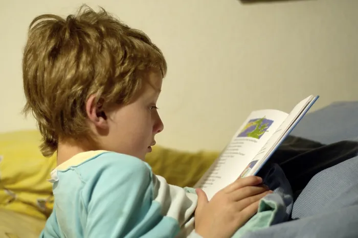 Framed Print : Boy Reading in Bed Print Framed Print : Boy Reading in Bed Print