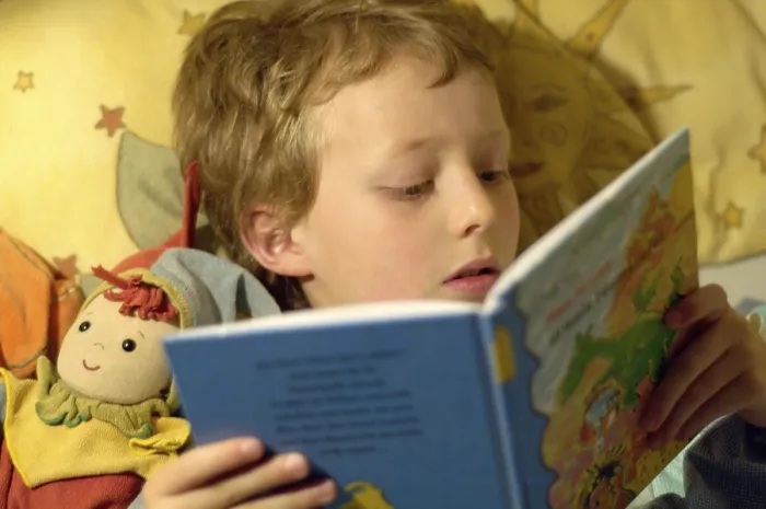 Framed Print : Boy Reading in Bed Print Framed Print : Boy Reading in Bed Print