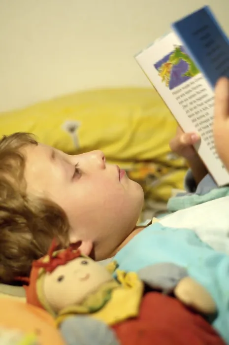 Framed Print : Boy Reading in Bed Print Framed Print : Boy Reading in Bed Print