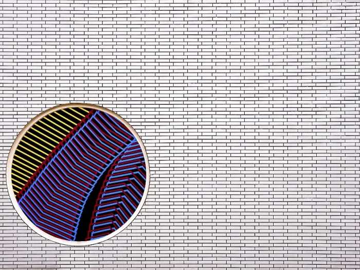 Framed Print : Part of a Brick Wall with Circular Mosaic Print, Berlin Framed Print : Part of a Brick Wall with Circular Mosaic Print, Berlin