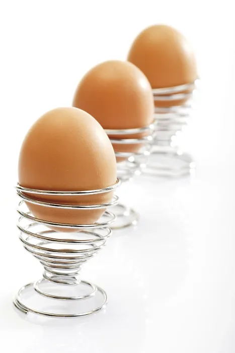 Framed Print : Brown Eggs in Wire Egg Cups Print Framed Print : Brown Eggs in Wire Egg Cups Print