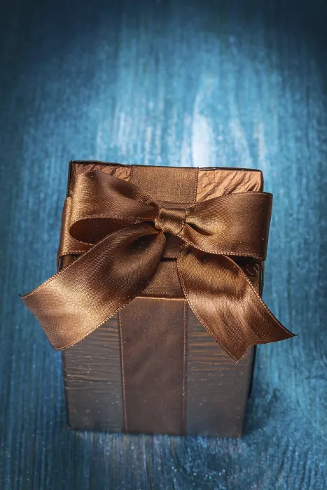 Framed Print : Brown Gift Box on Blue Board Print Framed Print : Brown Gift Box on Blue Board Print