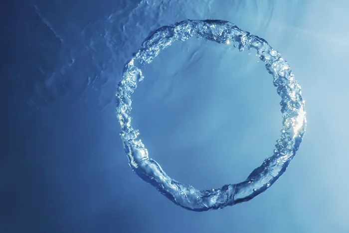 Framed Print : Bubble Ring Underwater Ascends Towards the Sun Print
