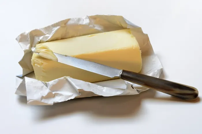 Framed Print : Butter with Opened Package and Knife Print
