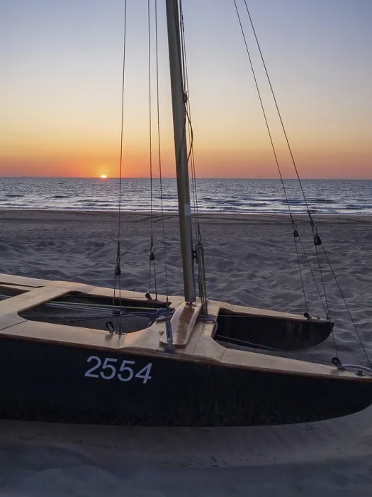 Framed Print : A Catamaran on the Beach at Sunset Print Framed Print : A Catamaran on the Beach at Sunset Print