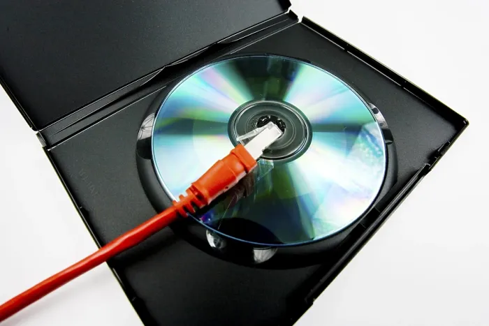 Framed Print : CD / DVD Print with Network Cable by imageBROKER Framed Print : CD / DVD Print with Network Cable by imageBROKER