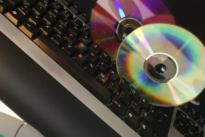 Framed Print : Cd Rom Print on Computer Keyboard Framed Print : Cd Rom Print on Computer Keyboard