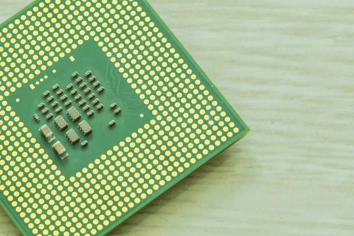 Framed Print : Bottom Side of CPU: Chips and Gold Pins on Wood Grain Print