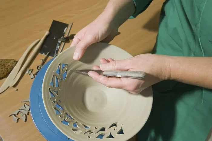 Framed Print : Ceramic Artist Working in Her Workshop Print Framed Print : Ceramic Artist Working in Her Workshop Print
