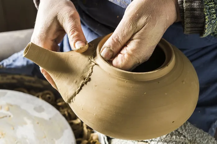 Framed Print : Ceramic Workshop Print: Hands Checking Pot Spout Fit Framed Print : Ceramic Workshop Print: Hands Checking Pot Spout Fit
