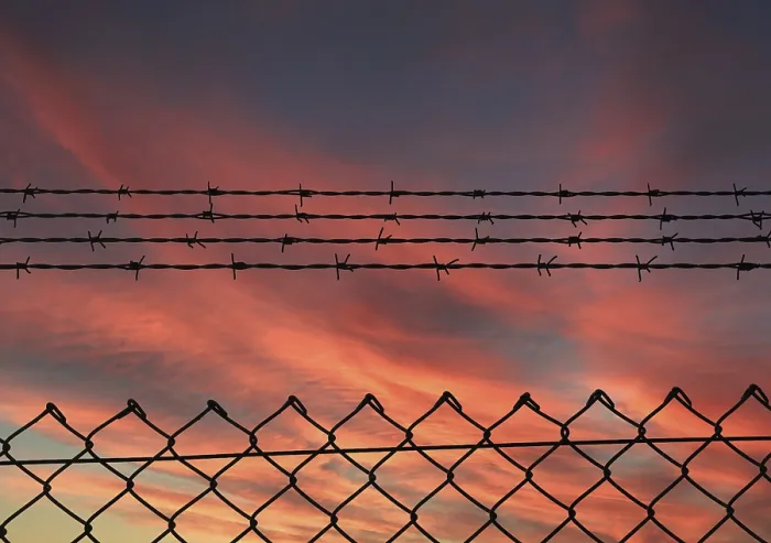 Framed Print : Chain Link Fence with Barbed Wire Print Framed Print : Chain Link Fence with Barbed Wire Print