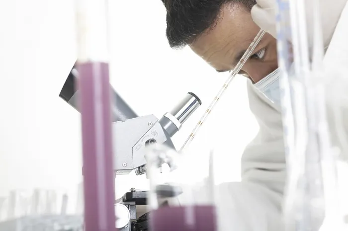 Framed Print : Chemist in a lab Print Framed Print : Chemist in a lab Print