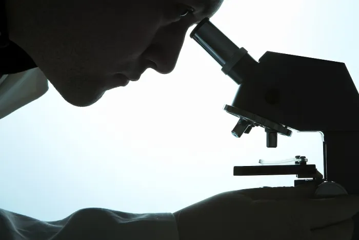Framed Print : Chemist Looking Through a Microscope Print Framed Print : Chemist Looking Through a Microscope Print