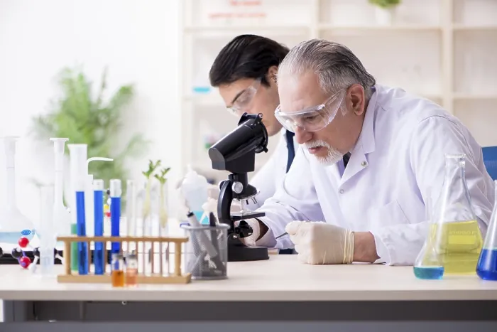 Framed Print : Two Chemists Working in the Lab Print Framed Print : Two Chemists Working in the Lab Print