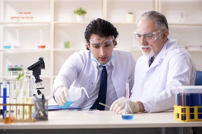 Framed Print : Two Chemists Working in the Lab Print Framed Print : Two Chemists Working in the Lab Print