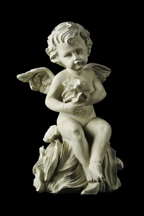 Framed Print : Cherub Print with Dramatic Side Lighting on Black Background Framed Print : Cherub Print with Dramatic Side Lighting on Black Background