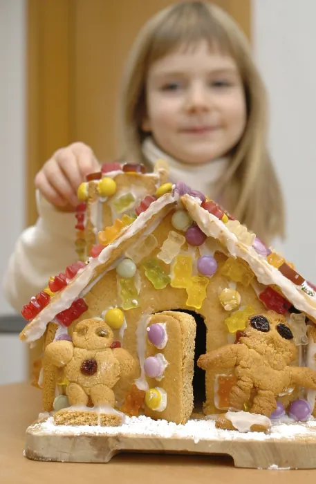 Framed Print : Child with Gingerbread House Print Framed Print : Child with Gingerbread House Print