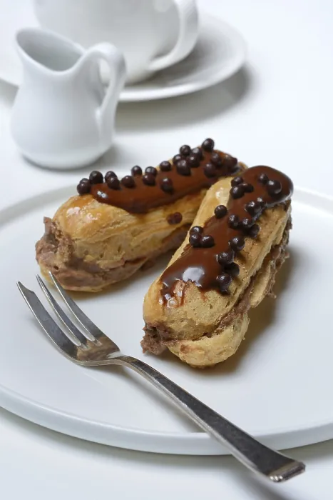 Framed Print : Two Chocolate Eclairs Print Framed Print : Two Chocolate Eclairs Print