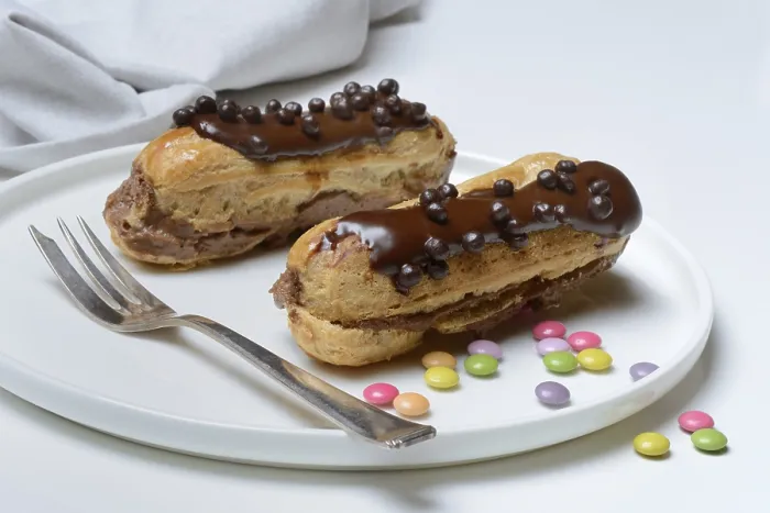 Framed Print : Two Chocolate Éclairs Print Framed Print : Two Chocolate Éclairs Print
