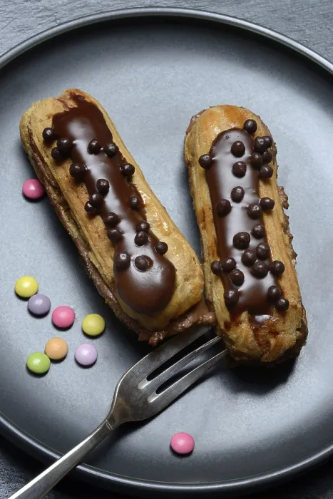 Framed Print : Two Chocolate Éclairs Print Framed Print : Two Chocolate Éclairs Print