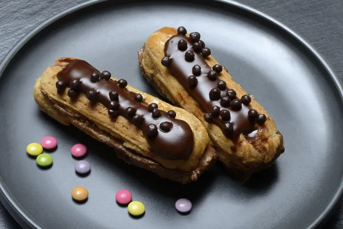 Framed Print : Two Chocolate Eclairs Print Framed Print : Two Chocolate Eclairs Print
