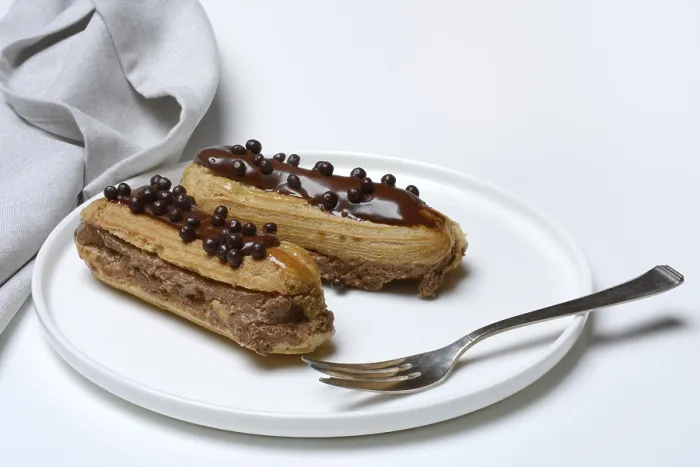Framed Print : Two Chocolate Eclairs Print Framed Print : Two Chocolate Eclairs Print