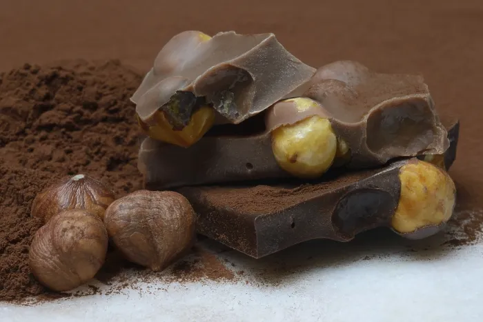 Framed Print : Chocolate with whole hazelnuts Print, Germany Framed Print : Chocolate with whole hazelnuts Print, Germany