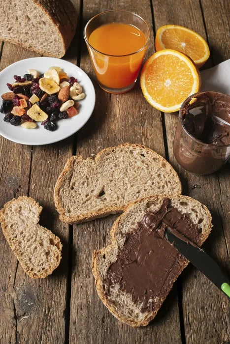 Framed Print : Chocolate Spread Bread Slice with Orange Juice Print Framed Print : Chocolate Spread Bread Slice with Orange Juice Print