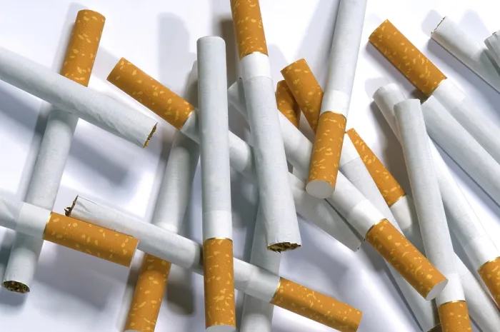 Framed Print : Few Cigarettes on White Background Print Framed Print : Few Cigarettes on White Background Print