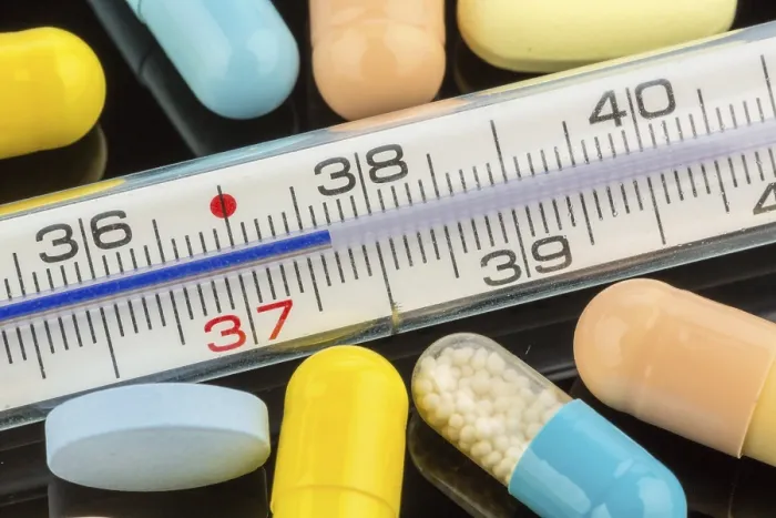 Framed Print : Clinical Thermometer and Medication Print Framed Print : Clinical Thermometer and Medication Print