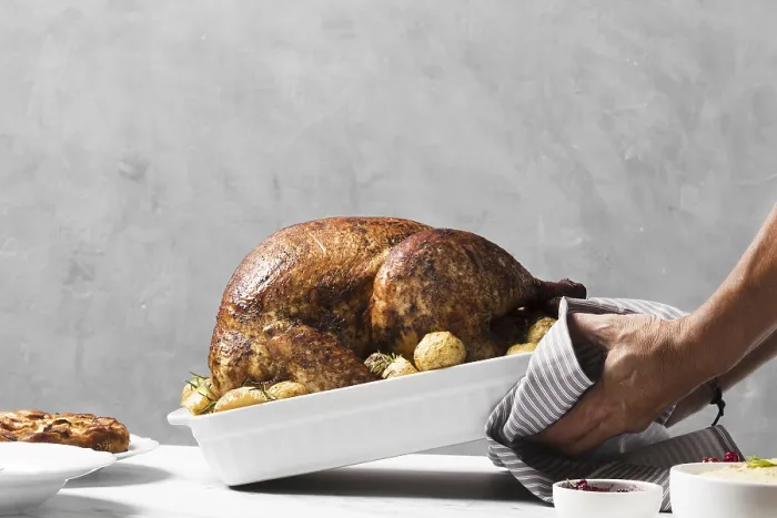 Framed Print : Close-up Hands Putting Turkey on Table Print Framed Print : Close-up Hands Putting Turkey on Table Print