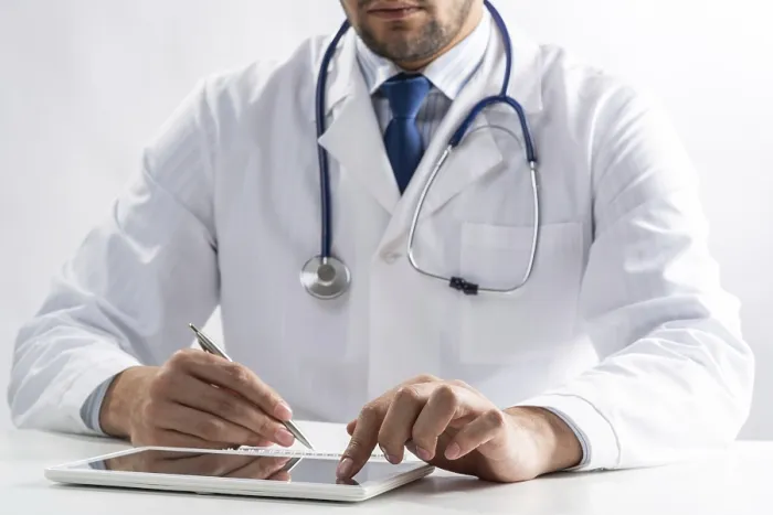 Framed Print : Close-up of Doctor Hands Using Tablet Print Framed Print : Close-up of Doctor Hands Using Tablet Print