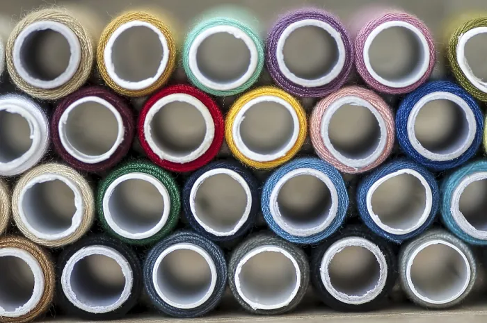 Framed Print : Close-up Print of Colored Sewing Threads on Spools Framed Print : Close-up Print of Colored Sewing Threads on Spools