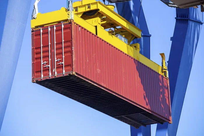Framed Print : Close-up of the loading of a shipping container Print Framed Print : Close-up of the loading of a shipping container Print