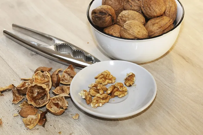 Framed Print : Walnuts on Table Print - Close-up Framed Print : Walnuts on Table Print - Close-up