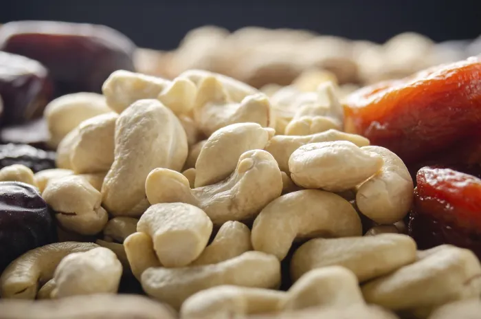 Framed Print : Closeup Print of Cashew Nuts on Kitchen Table Framed Print : Closeup Print of Cashew Nuts on Kitchen Table