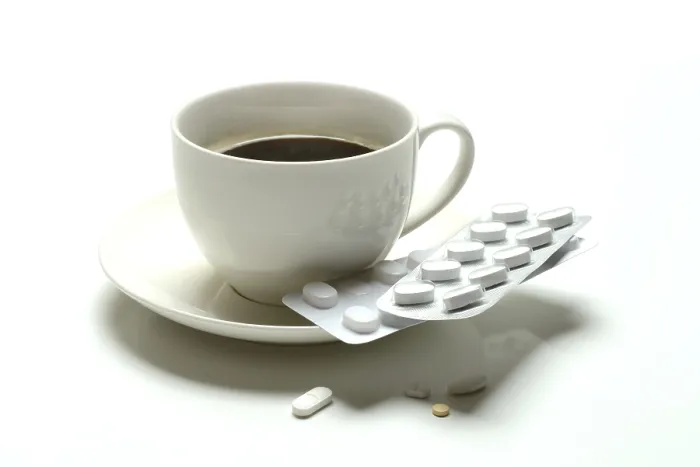 Framed Print : Coffee in a Cup with Medication Print Framed Print : Coffee in a Cup with Medication Print