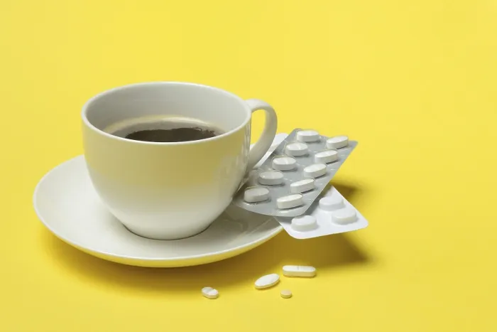 Framed Print : Coffee in a Cup with Medication Print Framed Print : Coffee in a Cup with Medication Print