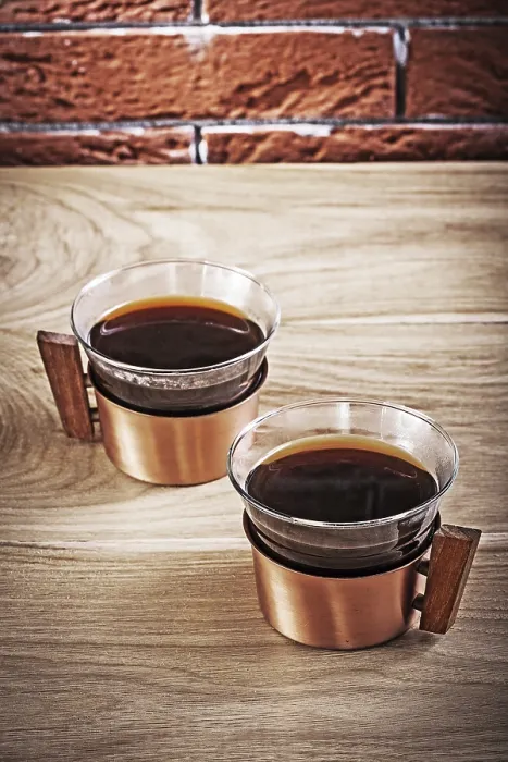 Framed Print : Coffee in old copper cups on the table Print Framed Print : Coffee in old copper cups on the table Print
