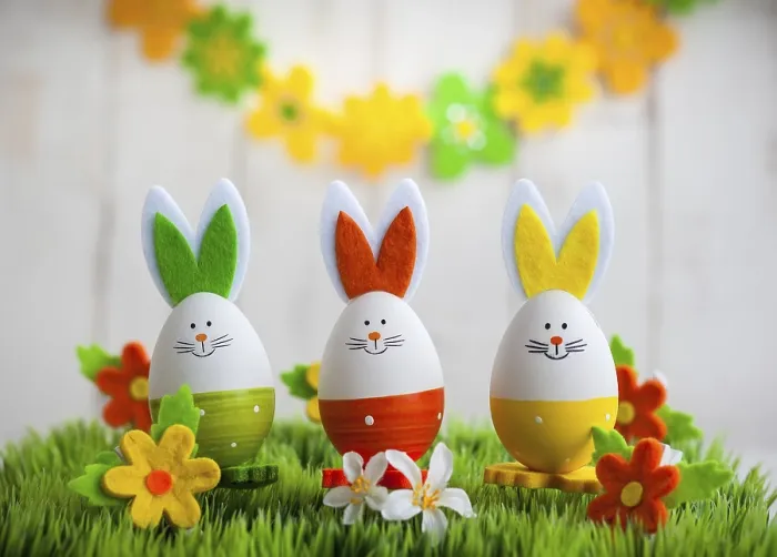 Framed Print : Three Colourful Easter Bunnies Print on Green Grass Framed Print : Three Colourful Easter Bunnies Print on Green Grass
