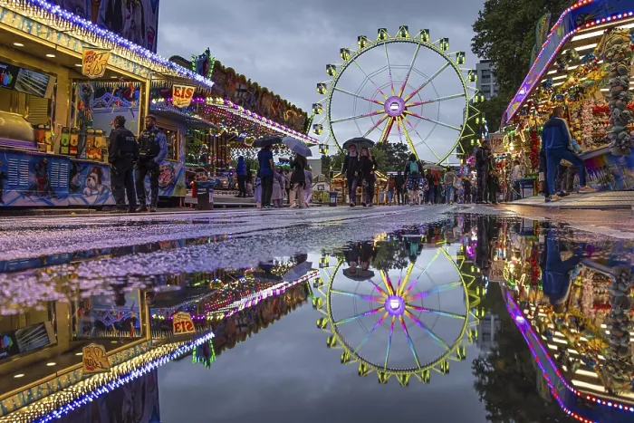 Framed Print : Colourful Mainfest Lights Reflected in Puddle Print
