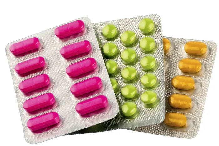 Framed Print : Colourful tablets in blister packaging Print Framed Print : Colourful tablets in blister packaging Print