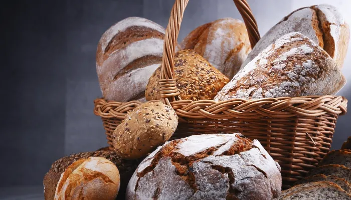 Framed Print : Composition with assorted bakery products in wicker basket Print Framed Print : Composition with assorted bakery products in wicker basket Print