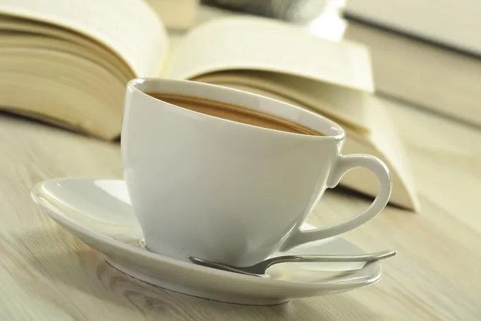 Framed Print : Composition with books and cup of coffee on the table Print Framed Print : Composition with books and cup of coffee on the table Print