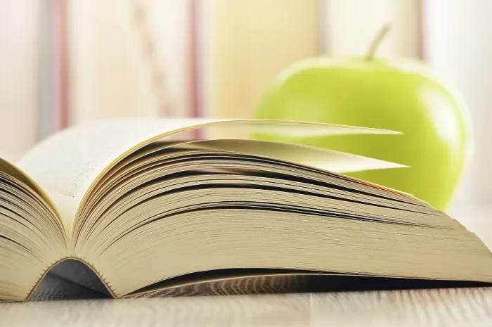 Framed Print : Composition with green apple and books on the table Print Framed Print : Composition with green apple and books on the table Print