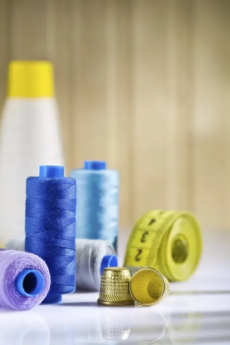 Framed Print : Composition of spools and thimbles with measure tape Print Framed Print : Composition of spools and thimbles with measure tape Print