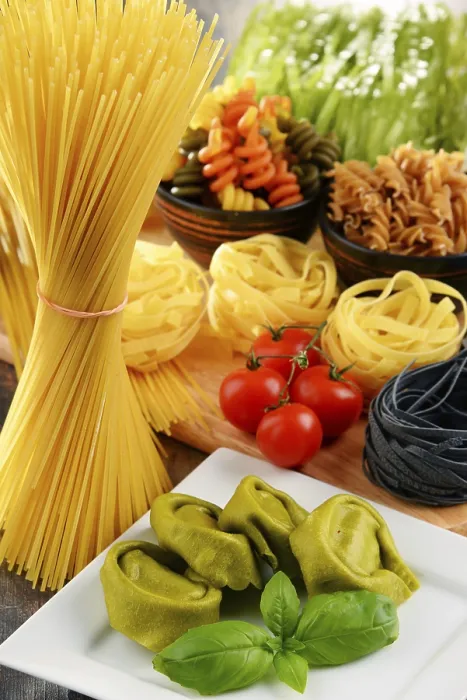 Framed Print : Composition with variety of pasta on kitchen table Print