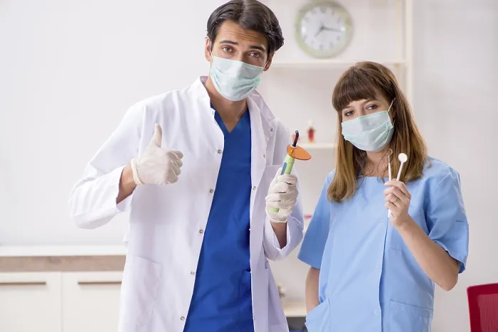 Framed Print : Dentist Treating Teeth Print Framed Print : Dentist Treating Teeth Print